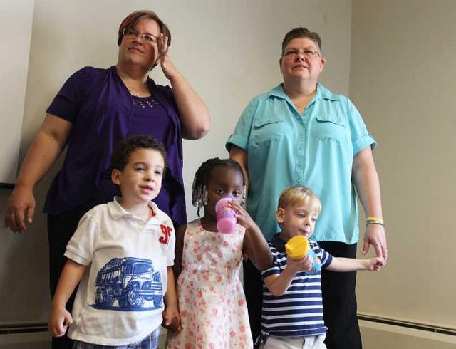 Lesbian moms April DeBoer and Jayne Rowse, from suburban Detroit, announced their challenge to Michigan’s constitutional ban on same-sex marriage with their three children at a news conference.