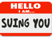 New Jersey Denies Fertility Treatment to Lesbians An image of a name tag that reads, "Hello, I am suing you."