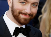 Celebrating LGBT Oscar Winners A photo of Sam Smith dressed in a tuxedo.