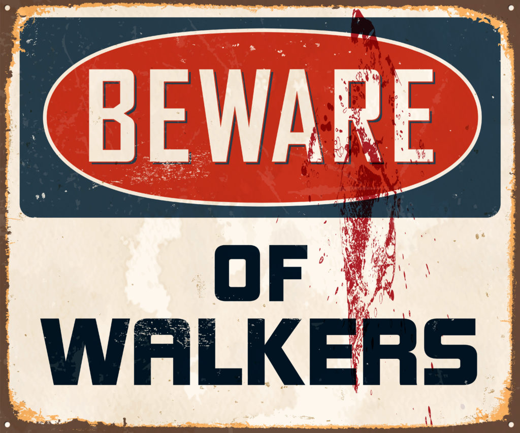 A bloody sign that reads, "Beware of walkers."