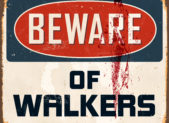The Walking Dead Is One of the Most Diverse Shows on Television A bloody sign that reads, "Beware of walkers."