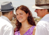Polygamy: The Next Big Fight in Equal Rights A photo of a woman with two male partners.