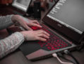 Girls Who Code Gets Some Big-Name Backing A female programmer typing away on her laptop.