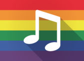 This Saturday is the South Florida Pride Wind Ensemble Concert A rainbow flag with a music note on the front of it.