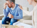 Warning: 6 Signs That You’re a Broflake A man crying. A female psychiatrist has her hand on his shoulder.