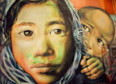 Art and the Immigrant Experience Graffiti art of an immigrant woman and her young son.