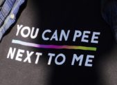 Texas Bathroom Bill ‘Dead and Buried’ A shirt that reads, "You can pee next to me."