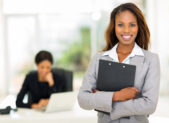 Women Entrepreneurs Finding More Access to Startup Funding A female businesswoman smiling into the camera.