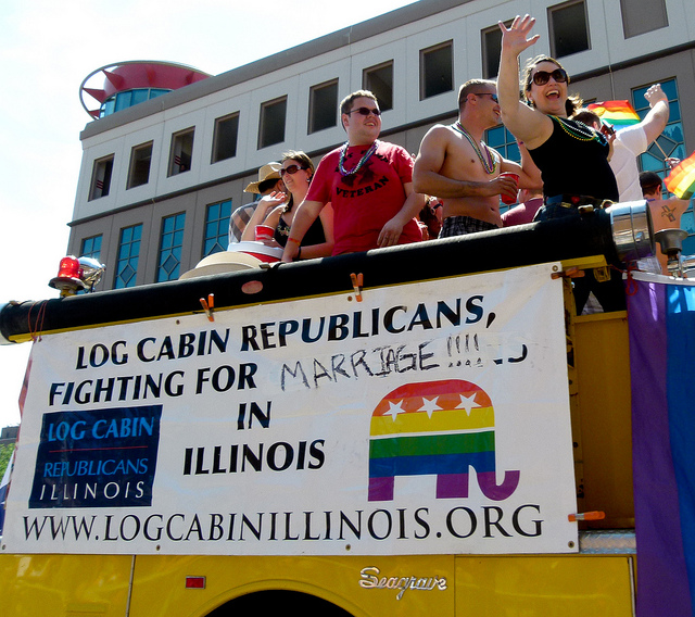 A truck with a banner supporting the Log Cabin Republicans of Illinois, an advocacy group for the LGBT community within the party.