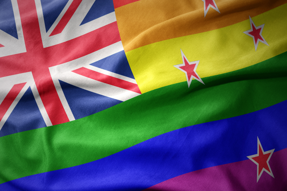 New Zealand's flag, pictured in rainbow colors.